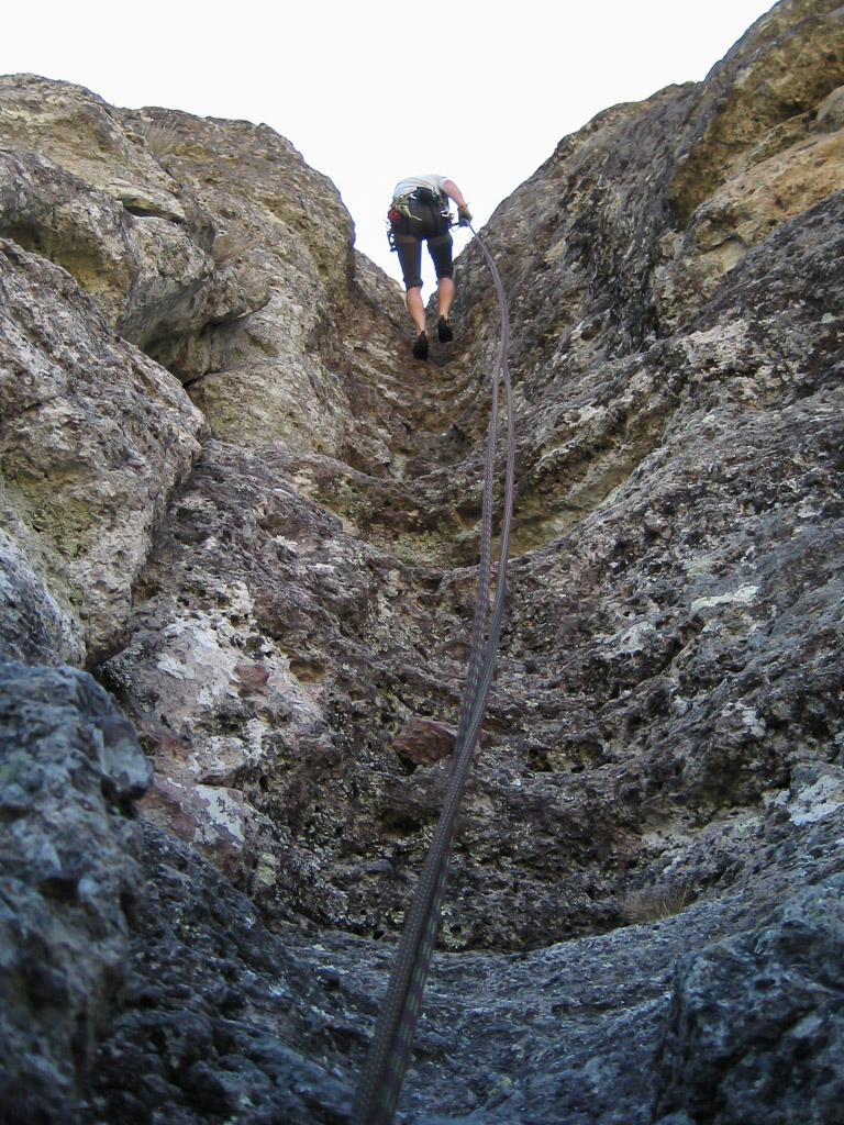 Tim rappelling from the summit.