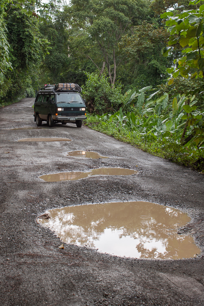 Van-swallowing potholes on the road out to Drake Bay.